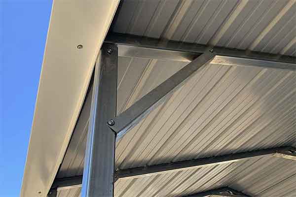 Wall bracing on a metal building frame