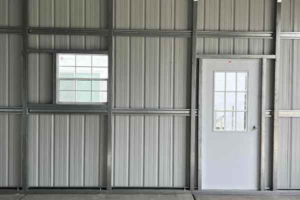 Wall hat channels for metal building