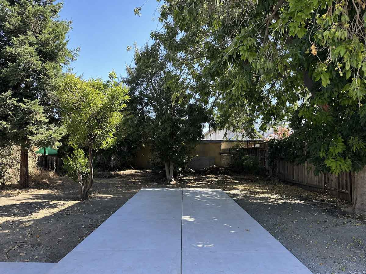 Concrete pad before a standard roof carport is installed