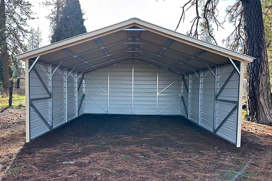 Three-sided metal carport firewood storage